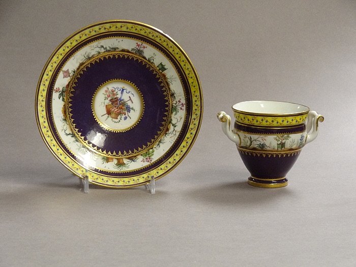 Two-Handled Cup and Saucer Slider Image 2